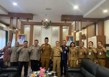 Bupati Hurmin Sambut Tim Monev KI Jambi, Sampaikan Komitmen Keterbukaan Informasi