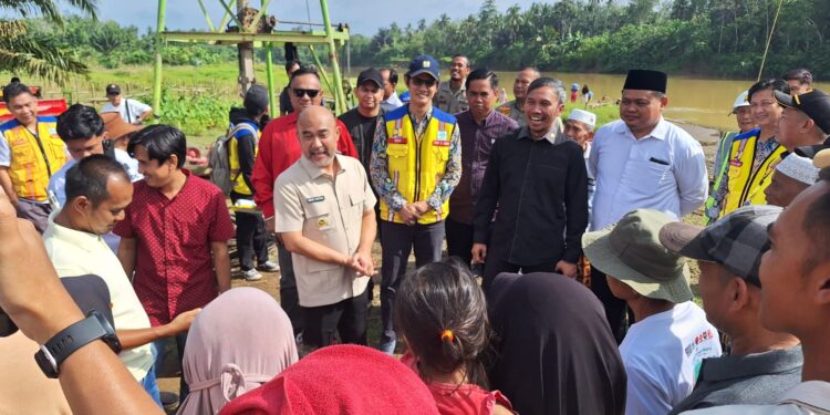 Reses di Bungo, Edi Purwanto Tinjau Lokasi Pembangunan Jembatan Desa Candi Senilai Rp14 Miliar