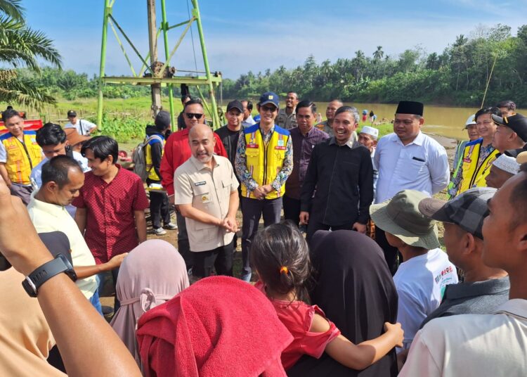 Reses di Bungo, Edi Purwanto Tinjau Lokasi Pembangunan Jembatan Desa Candi Senilai Rp14 Miliar